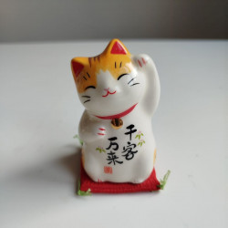 Gatto Manekineko zampa sinistra