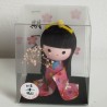 Kimono doll with flowers