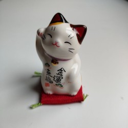 Gatto Manekineko zampa destra