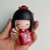 Kokeshi in resina Ventaglio